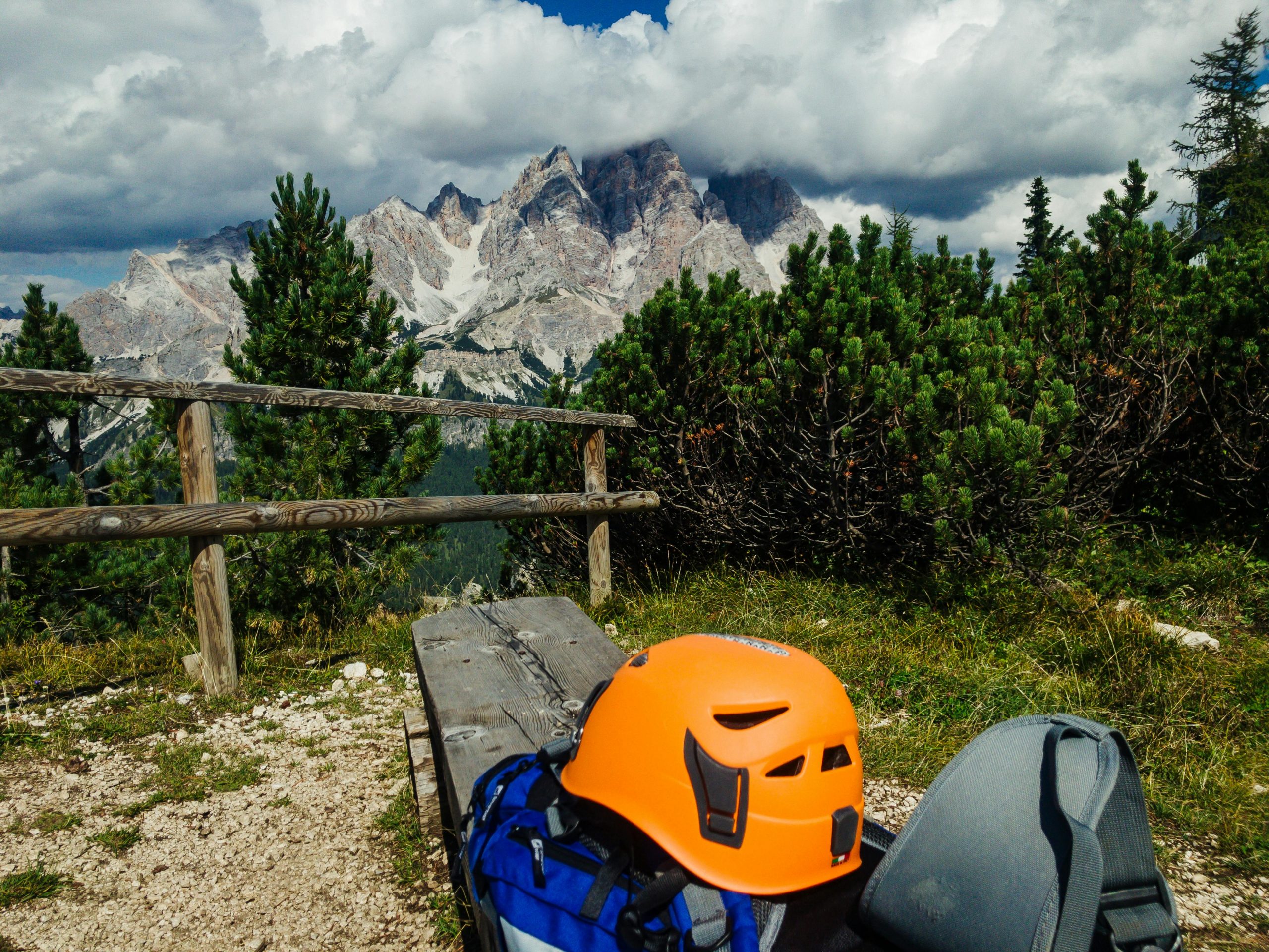 Explore the scenic mountain landscape with safety gear in the Dolomites.